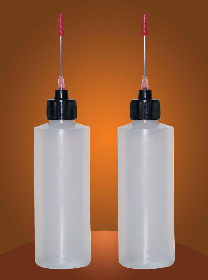 2-4 OZ bottles with 1.5 inch needle tip dispenser, pharmaceutical grade